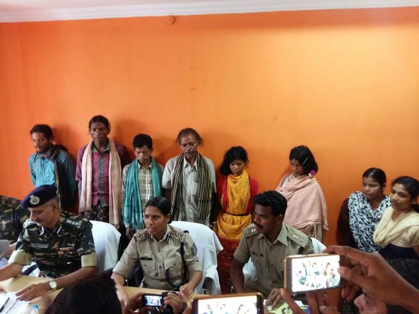 Kuni Sikaka (in yellow) with her relatives at the office of the superintendent of police at Rayagada, Odisha, on May 3. Kuni Sikaka (in yellow) with her relatives at the office of the superintendent of police at Rayagada, Odisha, on May 3.