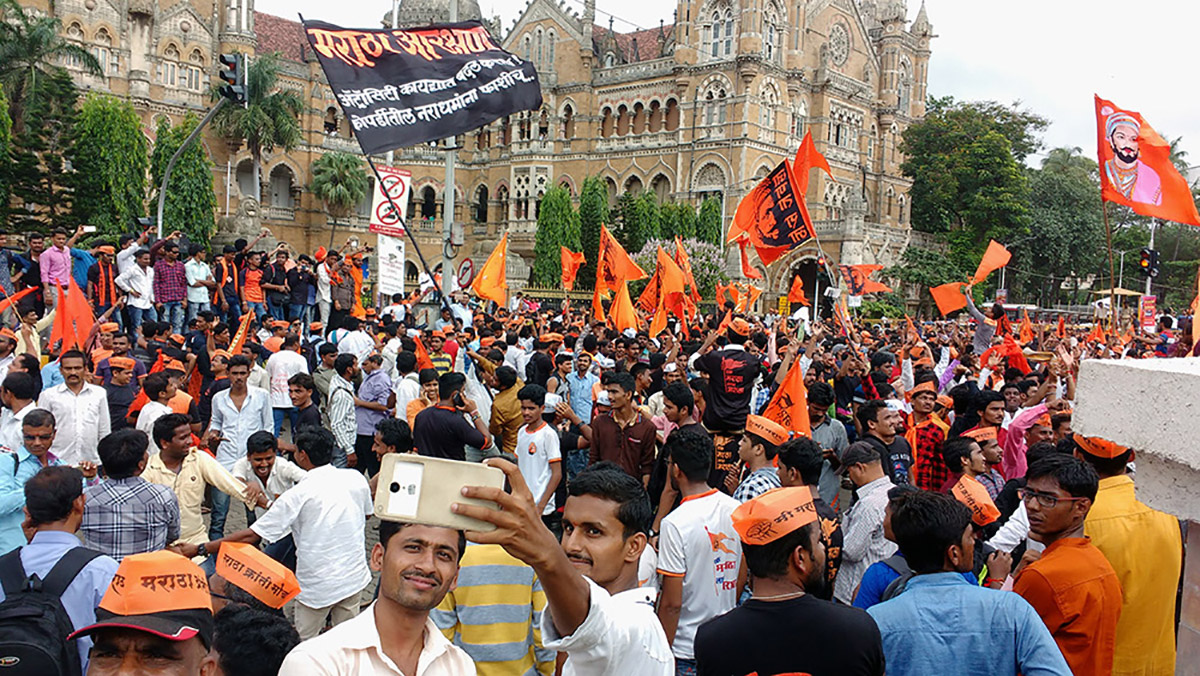 As crowds begin to disperse, participants took a break for lighter selfie moments. Photo: Mridula Chari As crowds begin to disperse, participants took a break for lighter selfie moments. Photo: Mridula Chari