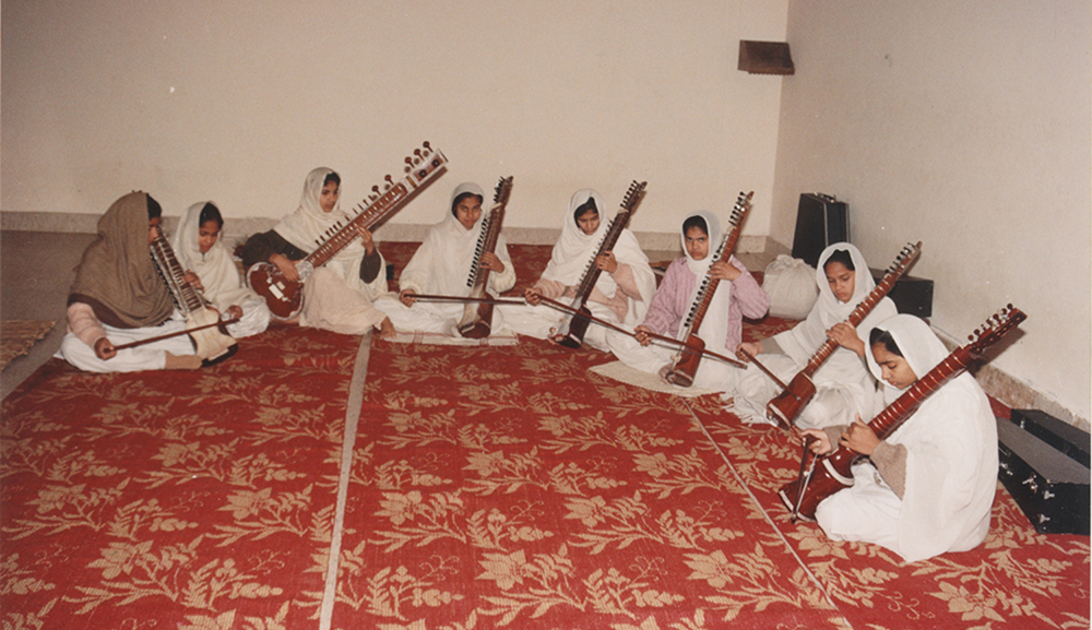 A class in progress, girls practising the dilruba . Image credit: V Dikshit A class in progress, girls practising the dilruba . Image credit: V Dikshit