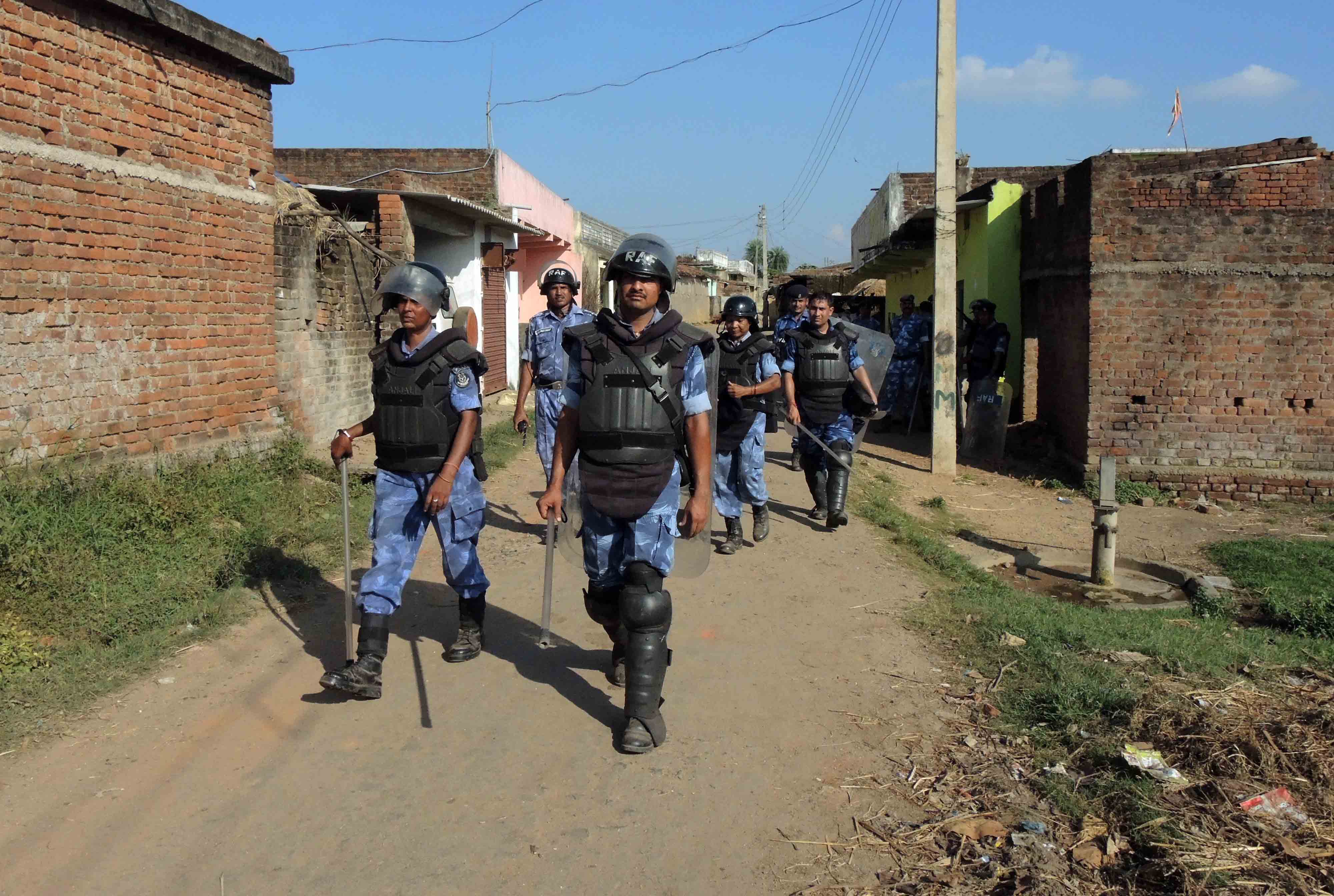 Rapid Action Force personnel and the police were deployed in the villages near the coal mine site on Monday. Credit: Manob Chowdhury Rapid Action Force personnel and the police were deployed in the villages near the coal mine site on Monday. Credit: Manob Chowdhury