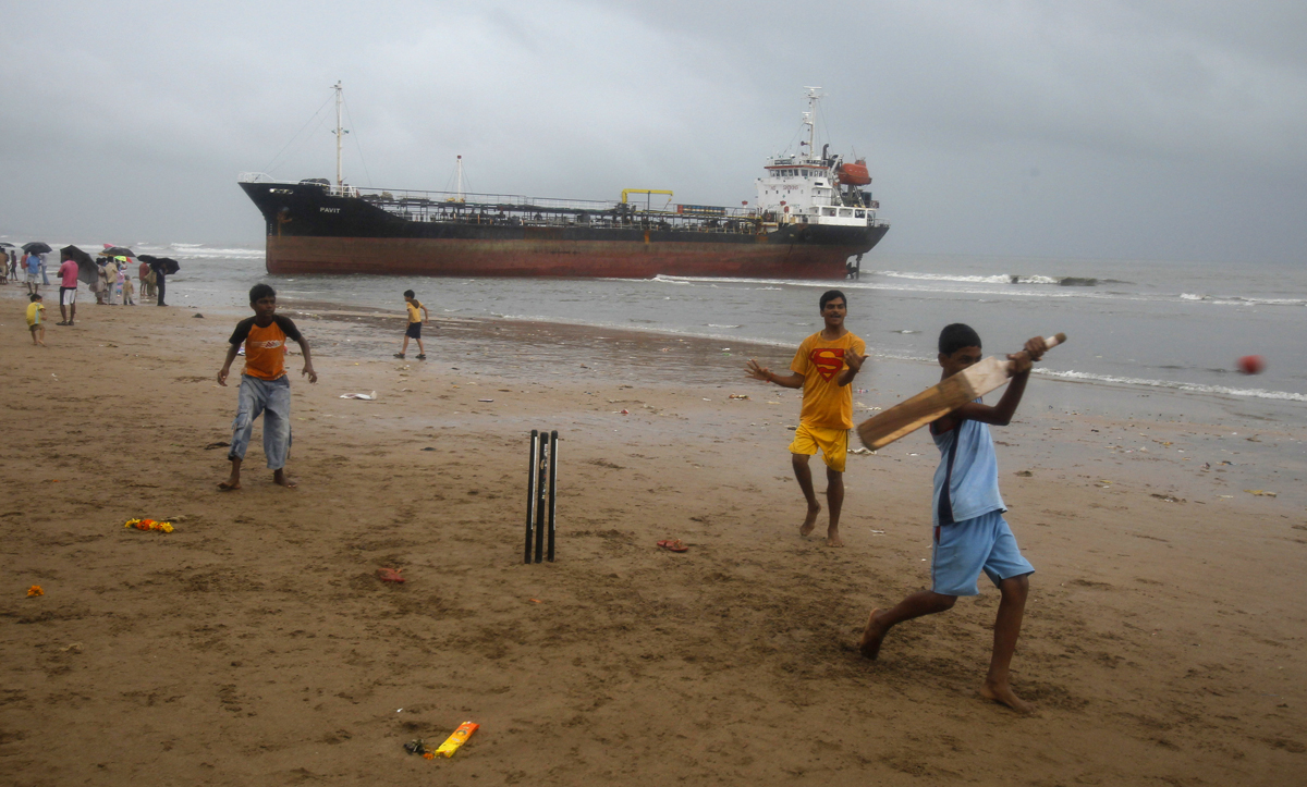 Children play cricket on Mumbai's Juhu Beach. Image credit: Vivek Prakash / Reuters Children play cricket on Mumbai's Juhu Beach. Image credit: Vivek Prakash / Reuters