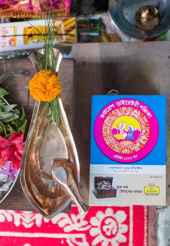 A copy of the Gupta Press Panjika at an altar. Photo credit: Rana Chakraborty. A copy of the Gupta Press Panjika at an altar. Photo credit: Rana Chakraborty.