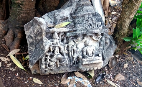 A Jain temple fragment, around 800 years old, lies discarded at the base of a tree behind a temple in Thane. Photo: Aarefa Johari A Jain temple fragment, around 800 years old, lies discarded at the base of a tree behind a temple in Thane. Photo: Aarefa Johari