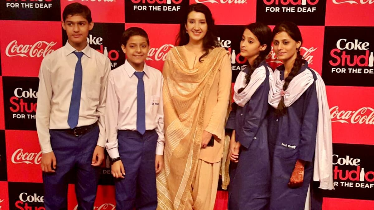 Singer Zeb Bangash with students of the Deaf Reach school. Singer Zeb Bangash with students of the Deaf Reach school.
