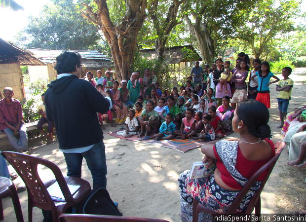 Arpana Choudhury, justice programme associate with Nazdeek, addresses a group of men, children and about 40 women in Narayanpur Tea Estate during a community meeting where women are educated about measures to take during pregnancy and informed about the rights that they are entitled to. Their grievances are also noted down and taken to local government officials. Arpana Choudhury, justice programme associate with Nazdeek, addresses a group of men, children and about 40 women in Narayanpur Tea Estate during a community meeting where women are educated about measures to take during pregnancy and informed about the rights that they are entitled to. Their grievances are also noted down and taken to local government officials.