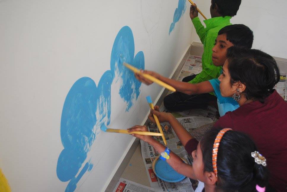 Painting the walls of Buguri in Bangalore. Credit: Hasirudala/Facebook.com Painting the walls of Buguri in Bangalore. Credit: Hasirudala/Facebook.com