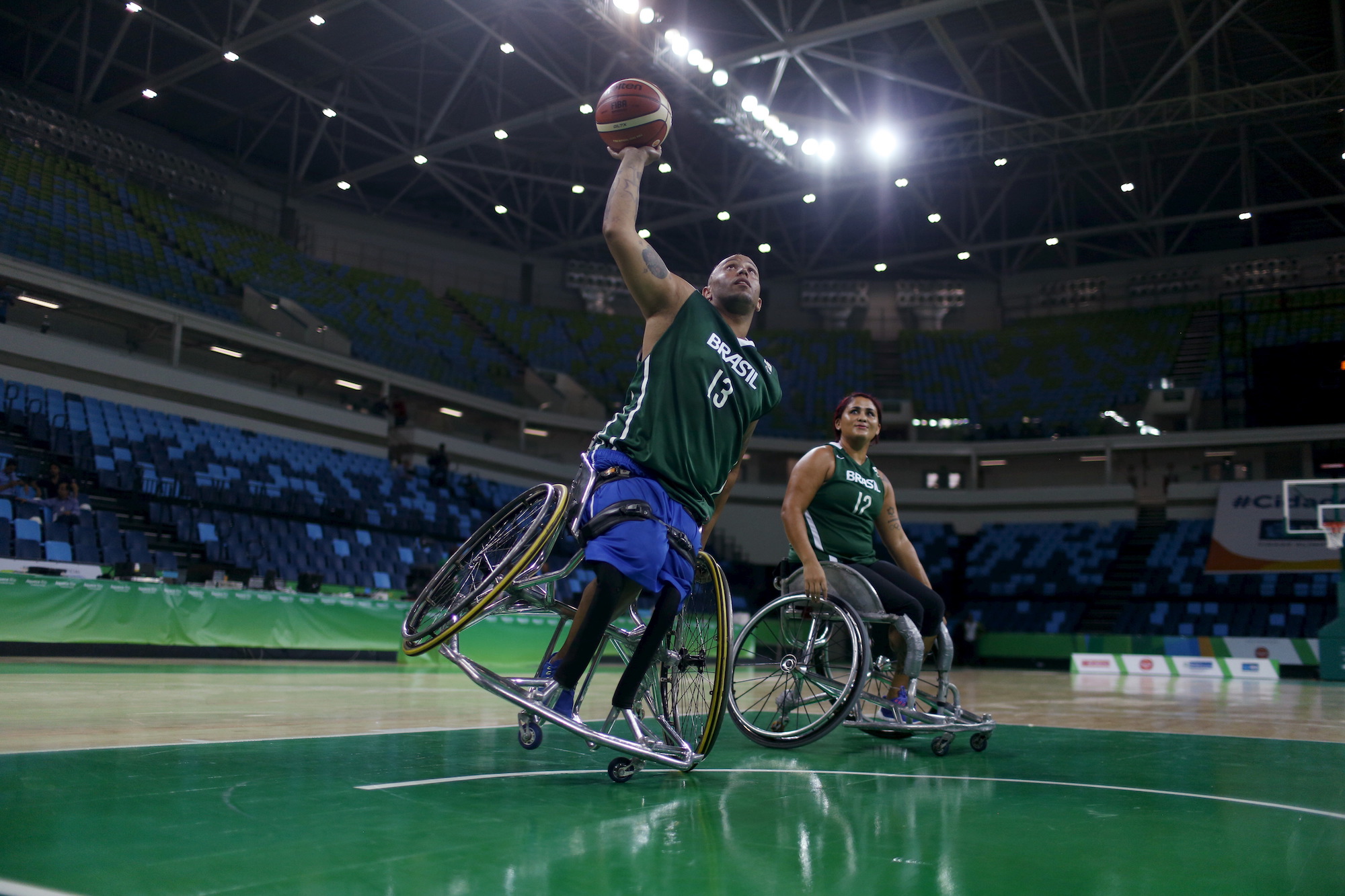 Paralympic athlete Leandro de Miranda throws a basketball. Image credit: Pilar Olivares / Reuters Paralympic athlete Leandro de Miranda throws a basketball. Image credit: Pilar Olivares / Reuters