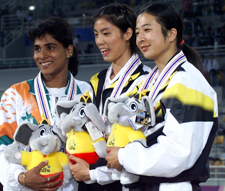 Mistry (left) with the bronze medal at the Asian Games in 1998. Image credit: Romeo Gacad/AFP Mistry (left) with the bronze medal at the Asian Games in 1998. Image credit: Romeo Gacad/AFP