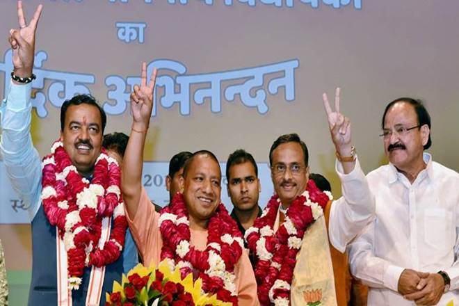 At the BJP state executive meet in May, Uttar Pradesh Deputy Chief Minister Keshav Prasad Maurya (left) had hit out at Chief Minister Adityanath for allegedly giving “preferential treatment” to “outsiders” in the government. (Credit: PTI) At the BJP state executive meet in May, Uttar Pradesh Deputy Chief Minister Keshav Prasad Maurya (left) had hit out at Chief Minister Adityanath for allegedly giving “preferential treatment” to “outsiders” in the government. (Credit: PTI)