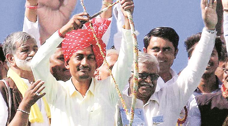 Other Backward Classes leader Alpesh Thakor (with bow and arrow) at a community rally in Ahmedabad in February. (Credit: PTI) Other Backward Classes leader Alpesh Thakor (with bow and arrow) at a community rally in Ahmedabad in February. (Credit: PTI)