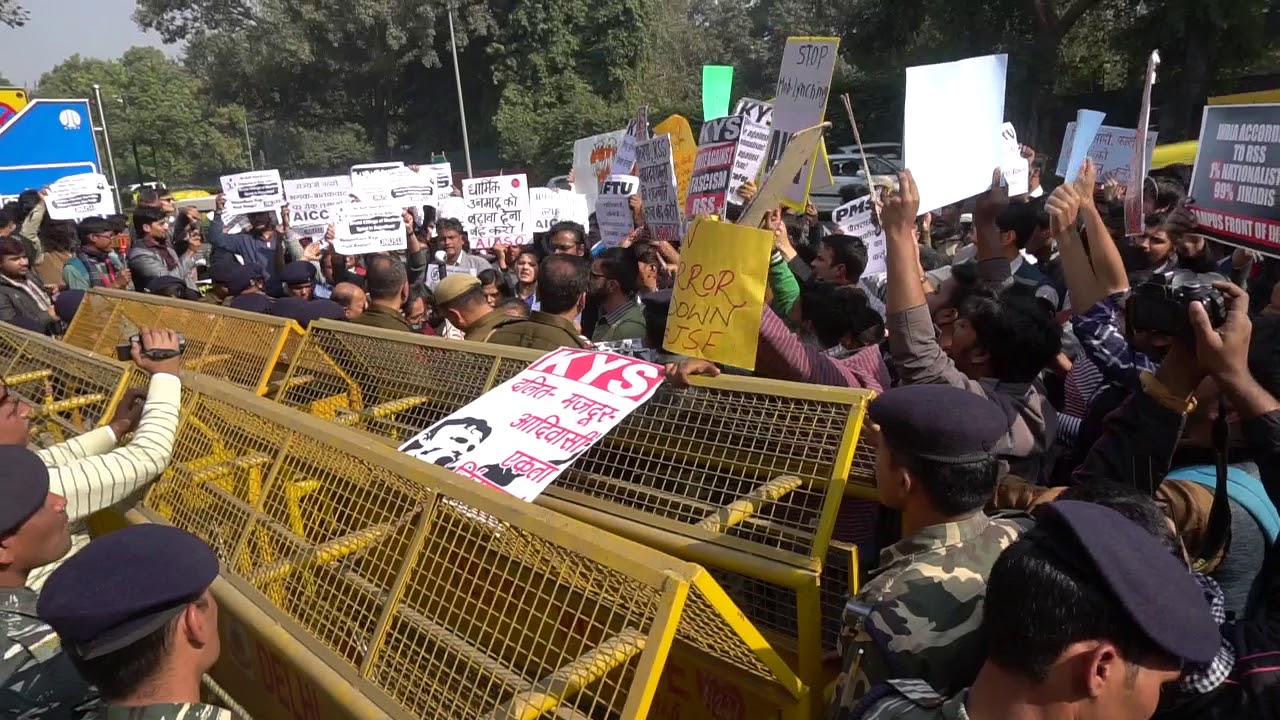 A demonstration against the murder of Afrazul Khan in front of Bikaner House in New Delhi. (Credit: YouTube) A demonstration against the murder of Afrazul Khan in front of Bikaner House in New Delhi. (Credit: YouTube)
