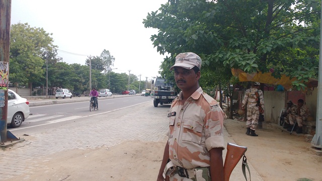 Jawans from the Indo-Tibetan Border Police stand guard outside the Sonepat District Collector's office where Jats are protesting for reservations. Jawans from the Indo-Tibetan Border Police stand guard outside the Sonepat District Collector's office where Jats are protesting for reservations.