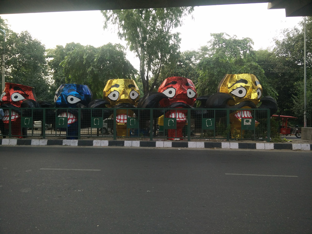 Decked up Raavan heads keeping each other company on a road divider. Photo: Rhema Mukti Baxter Decked up Raavan heads keeping each other company on a road divider. Photo: Rhema Mukti Baxter