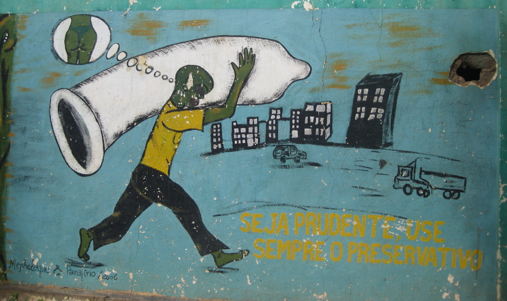 AIDS awareness painting on wall in Chimoio town, Mozambique. The text reads: "Be careful, always use a condom". (Photo: Ton RulkensFlickr) AIDS awareness painting on wall in Chimoio town, Mozambique. The text reads: "Be careful, always use a condom". (Photo: Ton RulkensFlickr)