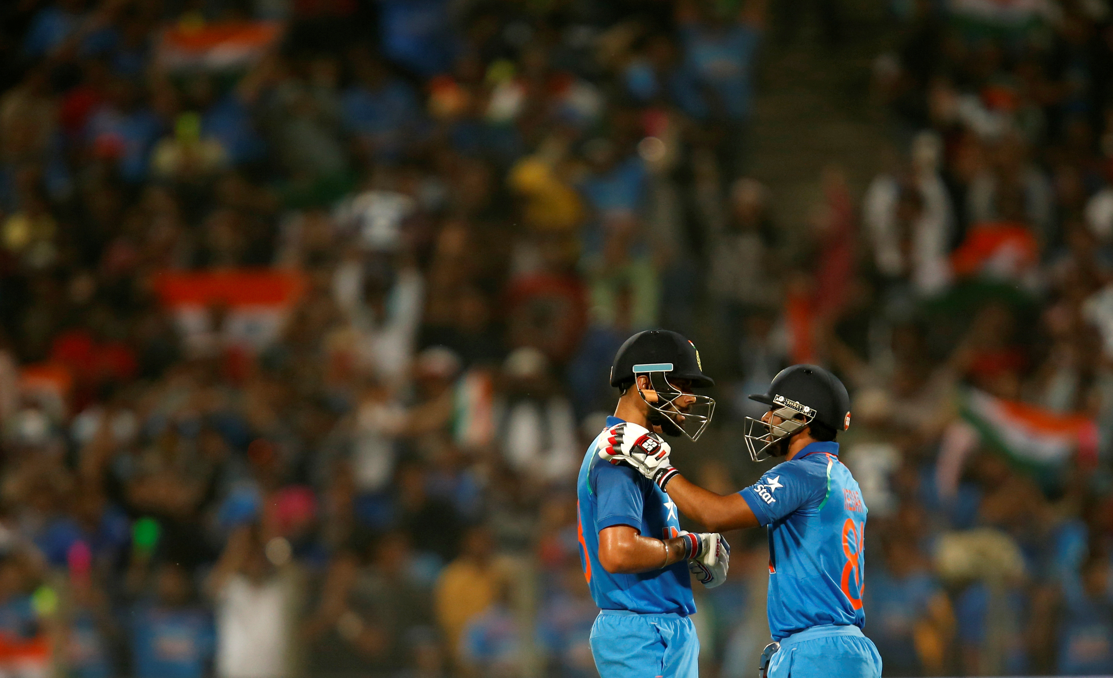 Virat Kohli (left) and Kedar Jadhav steered India through in their chase of 351 (Image credit: Reuters) Virat Kohli (left) and Kedar Jadhav steered India through in their chase of 351 (Image credit: Reuters)