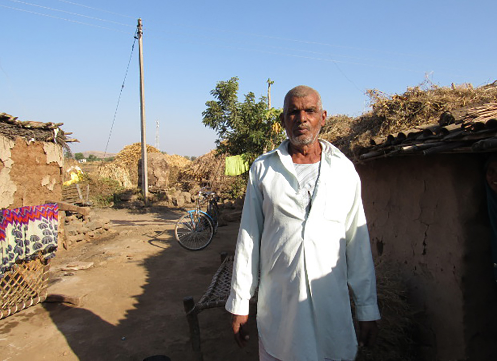 Gappu Daula, a Adivasi from the village of Rui, in Khargone district, Madhya Pradesh, has a bank account in which he receives pension from the government. “I don’t remember the name of the bank where I have an account, but I know where the bank is in the nearby town,” he said. Image Credits: Shreya Shah/Indiaspend Gappu Daula, a Adivasi from the village of Rui, in Khargone district, Madhya Pradesh, has a bank account in which he receives pension from the government. “I don’t remember the name of the bank where I have an account, but I know where the bank is in the nearby town,” he said. Image Credits: Shreya Shah/Indiaspend