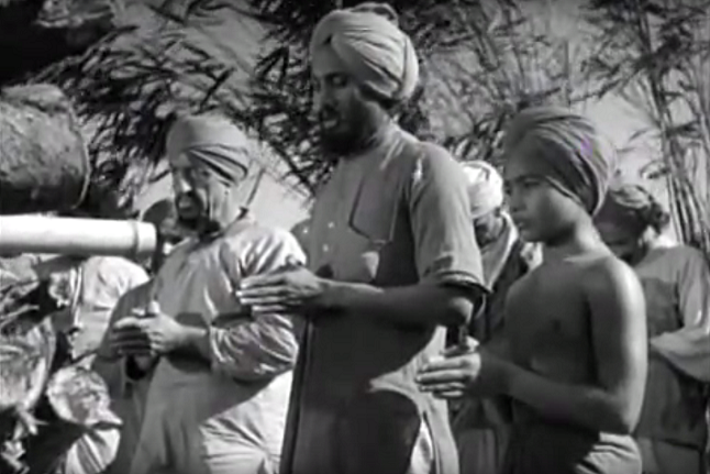 Udham Singh (centre) in a scene from Elephant Boy. Udham Singh (centre) in a scene from Elephant Boy.
