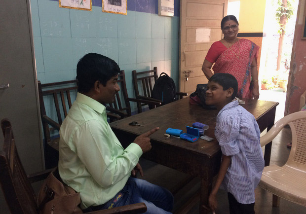 Sunil Bhadane, special educator with the Sarva Shiksha Abhiyan, with Javed Sheikh, whom he spotted four years ago. (Photo credit: Swagata Yadavar/Indiaspend.com) Sunil Bhadane, special educator with the Sarva Shiksha Abhiyan, with Javed Sheikh, whom he spotted four years ago. (Photo credit: Swagata Yadavar/Indiaspend.com)