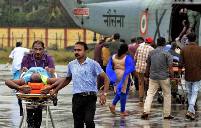 Indian Navy rescuing fishermen. (PTI Photo) Indian Navy rescuing fishermen. (PTI Photo)