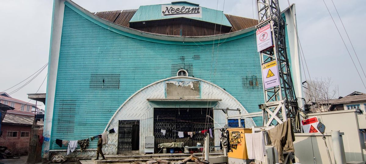 The Neelam cinema in central Srinagar is today a paramilitary camp. Photo: Rayan Naqash The Neelam cinema in central Srinagar is today a paramilitary camp. Photo: Rayan Naqash