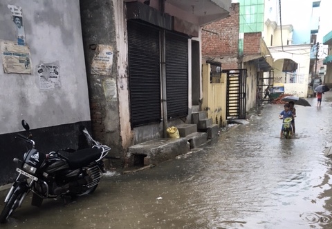 Sewage-flooded streets of Sarfabad, Noida. Photo: Menaka Rao Sewage-flooded streets of Sarfabad, Noida. Photo: Menaka Rao