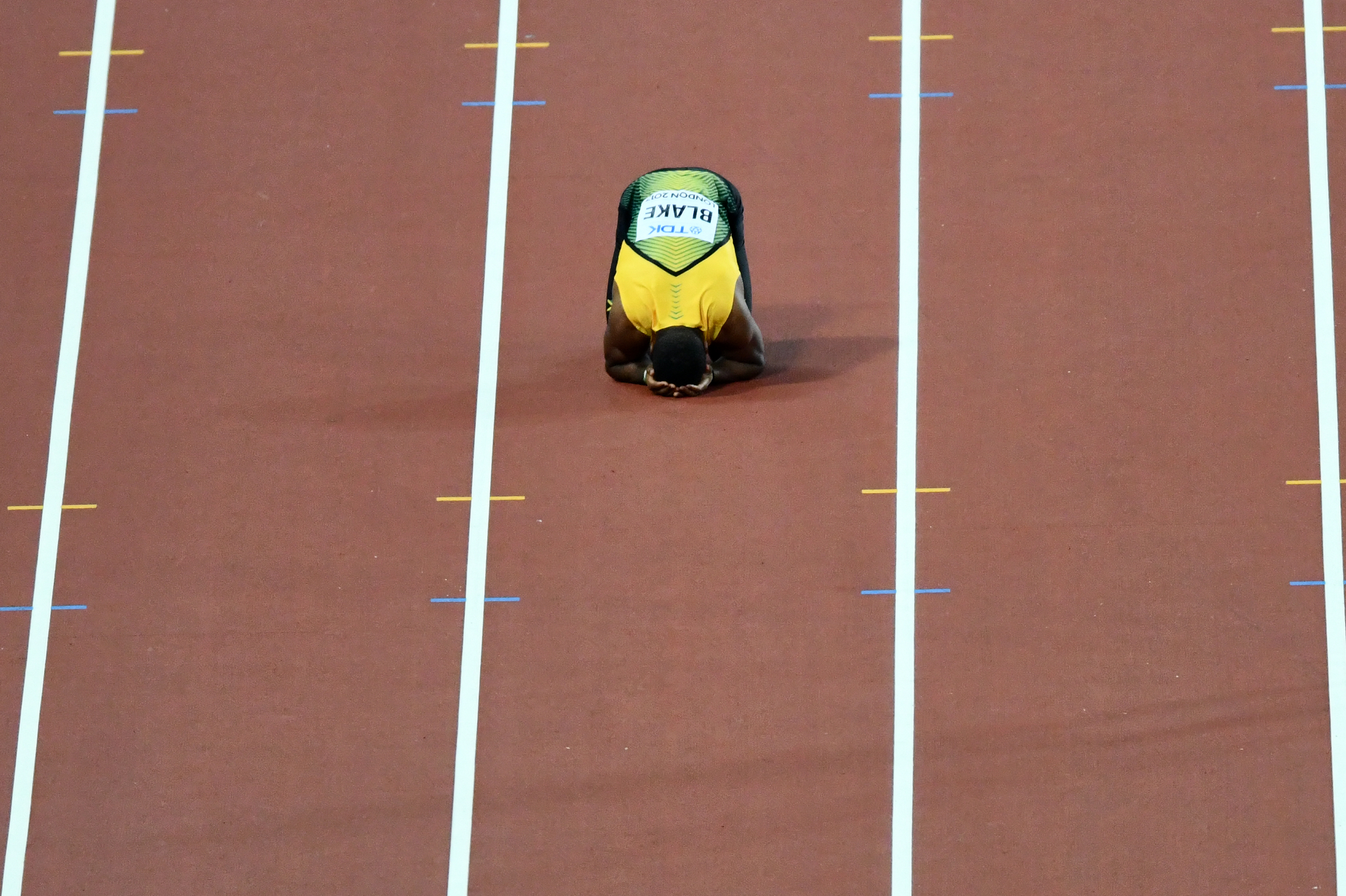 Bolt's Jamaican team-mate Yohan Blake can't believe the ending. AFP Bolt's Jamaican team-mate Yohan Blake can't believe the ending. AFP