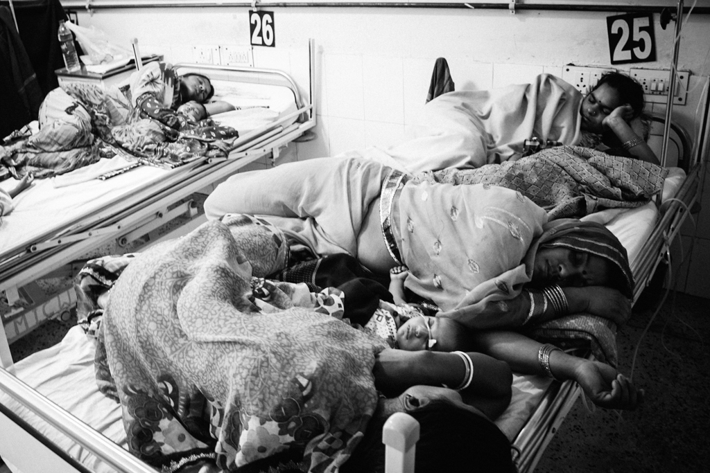 The corridors, paediatric and epidemic wards are crowded with parents of children being treated for encephalitis. The corridors, paediatric and epidemic wards are crowded with parents of children being treated for encephalitis.