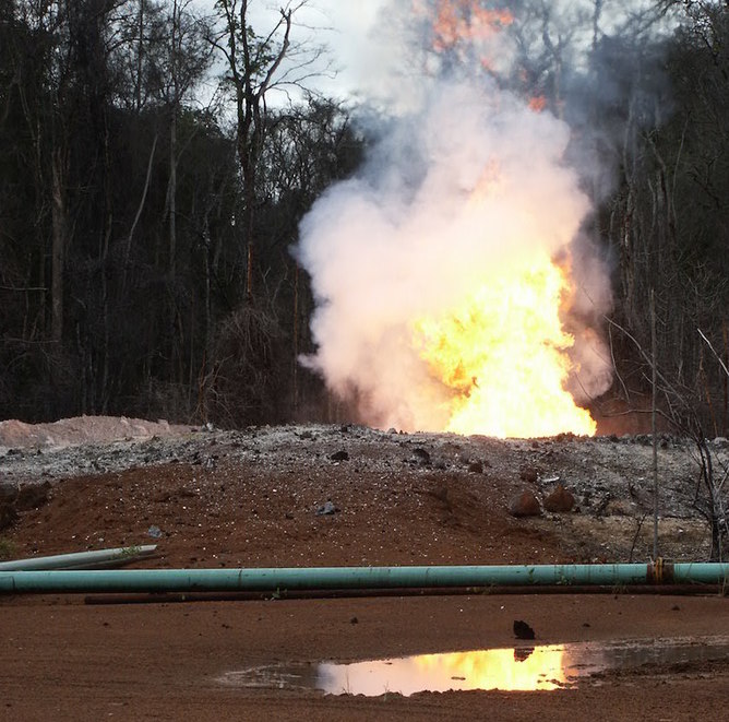 Gas flare from an oil field in the Congo Basin rainforest. William Laurance Gas flare from an oil field in the Congo Basin rainforest. William Laurance