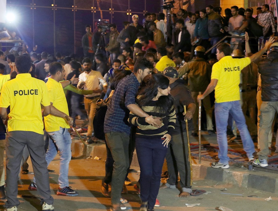 Police personnel try to manage crowds during New Year's Eve celebrations in Bengaluru. Credit: AFP Police personnel try to manage crowds during New Year's Eve celebrations in Bengaluru. Credit: AFP