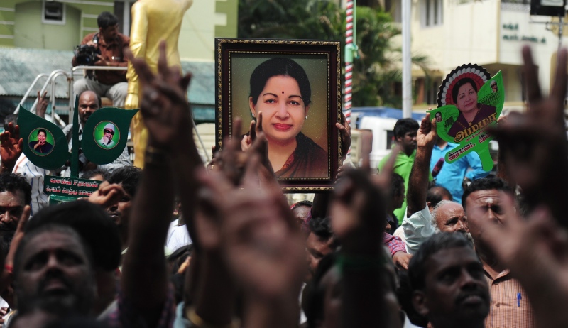 Members of the AIADMK carry placards with the image of Jayalalithaa as they celebrate the party’s victory in the Assembly polls in May 2016 in Chennai. (Photo credit: AFP/Arun Sankar) Members of the AIADMK carry placards with the image of Jayalalithaa as they celebrate the party’s victory in the Assembly polls in May 2016 in Chennai. (Photo credit: AFP/Arun Sankar)
