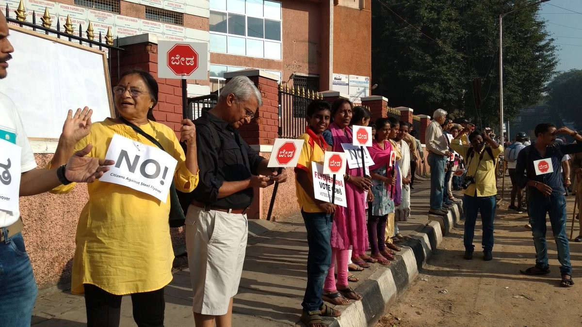 In October, hundreds of Bangalore residents formed a human chain to protest against the proposed steel road. In October, hundreds of Bangalore residents formed a human chain to protest against the proposed steel road.