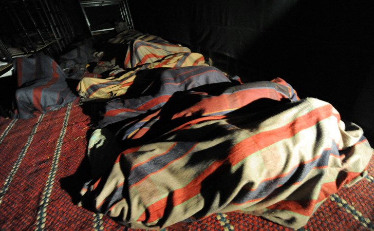 A makeshift night shelter in Delhi. Photo credit: Prakash Singh/AFP. A makeshift night shelter in Delhi. Photo credit: Prakash Singh/AFP.