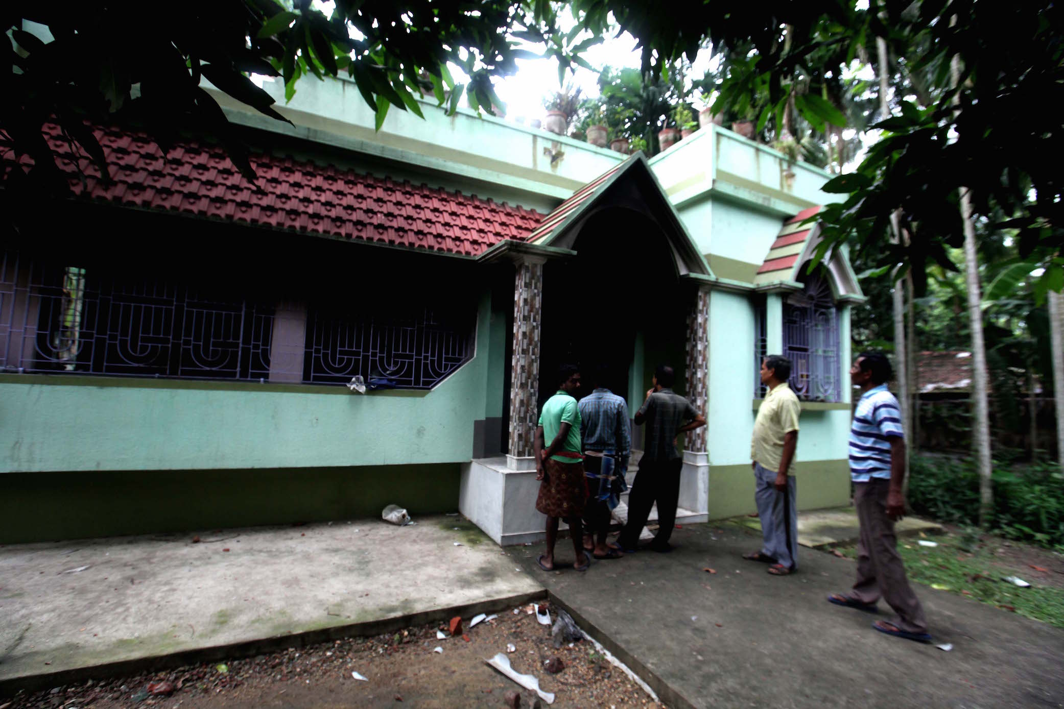 A view of the house where the student lived with his uncle. The front of the house was largely intact. Photo credit: Subrata Nag Choudhury A view of the house where the student lived with his uncle. The front of the house was largely intact. Photo credit: Subrata Nag Choudhury