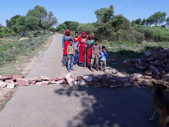 Women and children set up a roadblock during the Sikar agitation. Women and children set up a roadblock during the Sikar agitation.