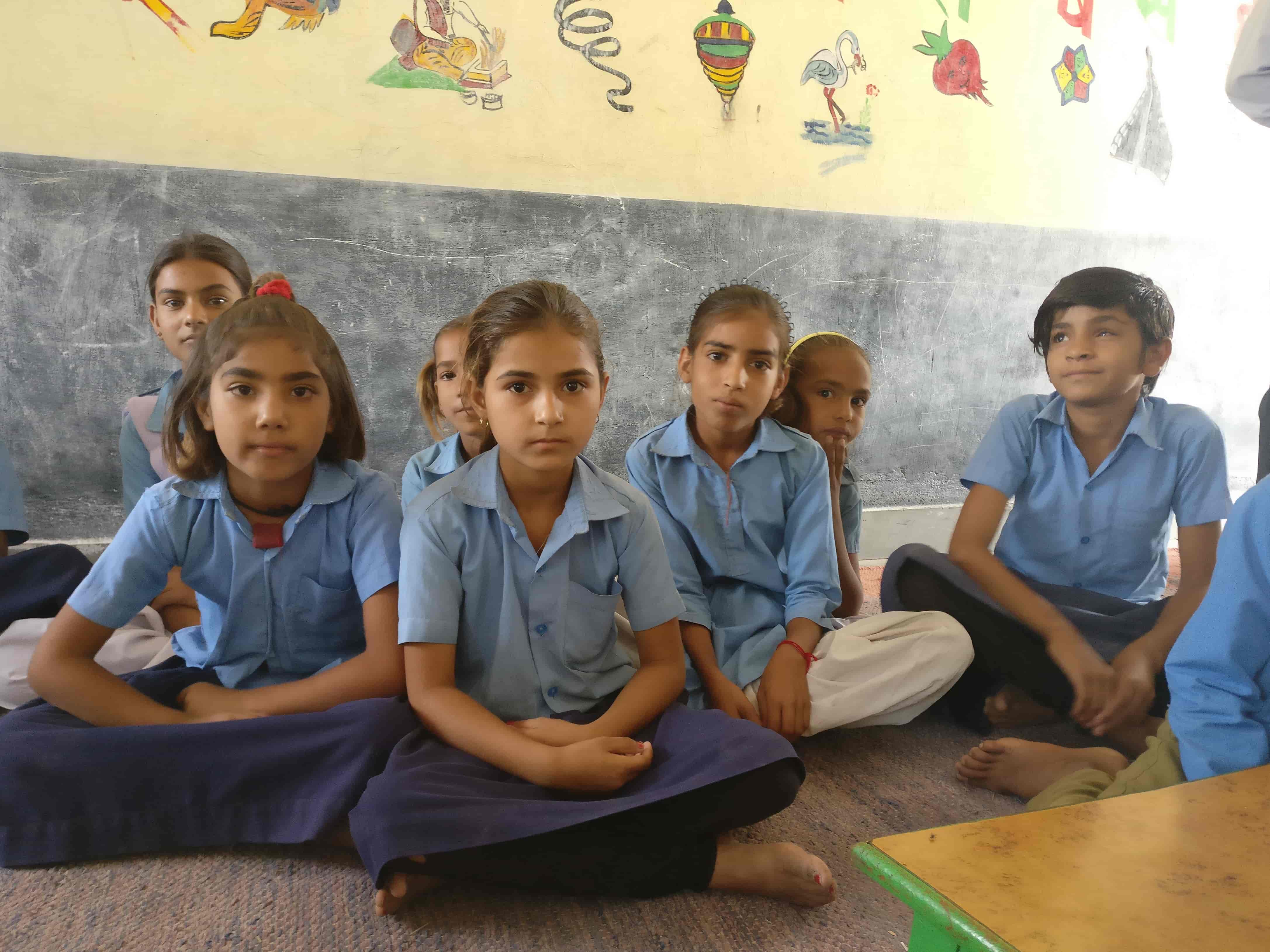 Anita Gujjar (centre) leaves home at 7 am to get to school by 8 am every day. Most of her classmates do the same and they are not accompanied by adults. Anita Gujjar (centre) leaves home at 7 am to get to school by 8 am every day. Most of her classmates do the same and they are not accompanied by adults.
