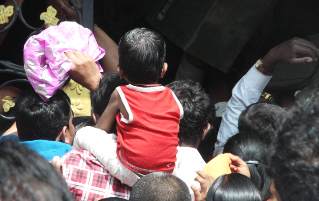 Customers wait outside a bank in Bangalore. IANS Customers wait outside a bank in Bangalore. IANS