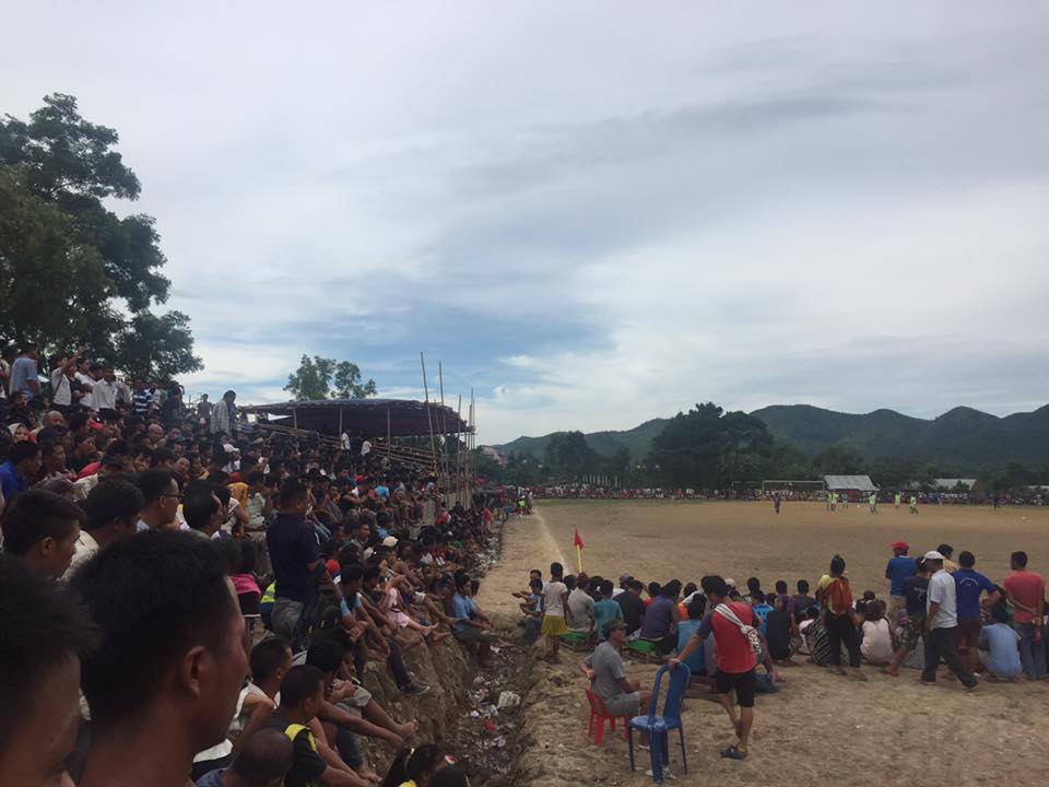 A group of spectators watches a district match in Churachandpur. (Image courtesy: Junior Zemz) A group of spectators watches a district match in Churachandpur. (Image courtesy: Junior Zemz)