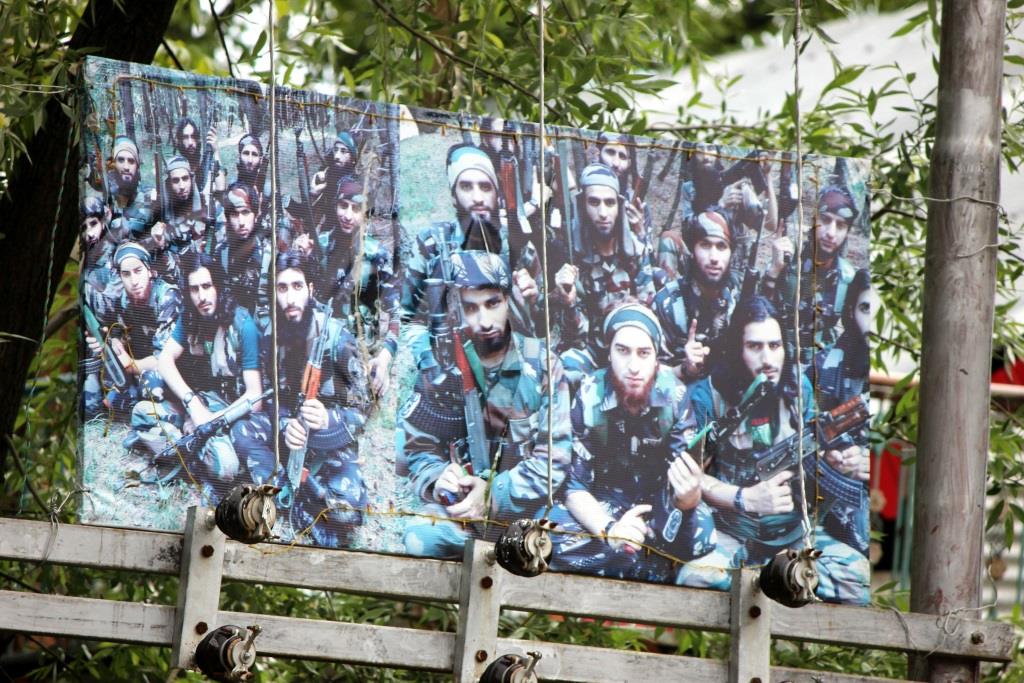Poster of militants outside Abdul Gani Dar's house. Picture credit: Muneeb ul Islam Poster of militants outside Abdul Gani Dar's house. Picture credit: Muneeb ul Islam