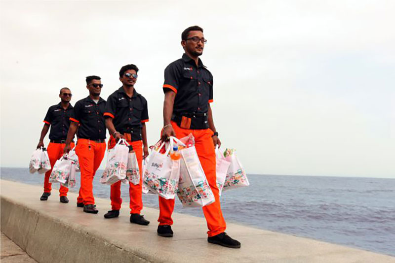 Uniformed delivery boys. Photo credit: Scootsy Uniformed delivery boys. Photo credit: Scootsy