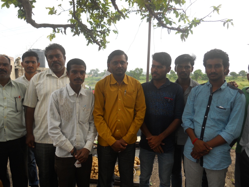 Santosh Jadhav (orange shirt), acquitted in a caste atrocity case, with other members of the Maratha community in Pal village in Aurangabad. (Photo credit: Rahi Gaikwad). Santosh Jadhav (orange shirt), acquitted in a caste atrocity case, with other members of the Maratha community in Pal village in Aurangabad. (Photo credit: Rahi Gaikwad).