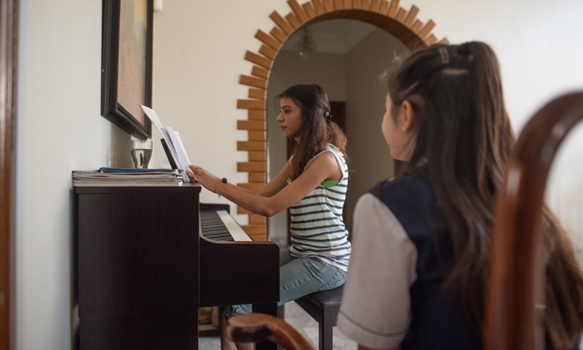 Natasha Humera Ejaz gives singing lessons to a young student| Mohammad Ali, White Star Natasha Humera Ejaz gives singing lessons to a young student| Mohammad Ali, White Star