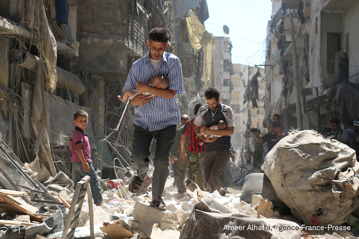 Spot News, second prize (stories) | Rescued from the Rubble: Syrian men carrying babies make their way through the rubble of destroyed buildings following a reported airstrike on the rebel-held Salihin neighborhood of Aleppo. Airstrikes have killed dozens in rebel-held parts of Syria as the opposition considers whether to join a US-Russia truce deal due to take effect on September 12. (Ameer Alhalbi for Agence France-Presse) Spot News, second prize (stories) | Rescued from the Rubble: Syrian men carrying babies make their way through the rubble of destroyed buildings following a reported airstrike on the rebel-held Salihin neighborhood of Aleppo. Airstrikes have killed dozens in rebel-held parts of Syria as the opposition considers whether to join a US-Russia truce deal due to take effect on September 12. (Ameer Alhalbi for Agence France-Presse)