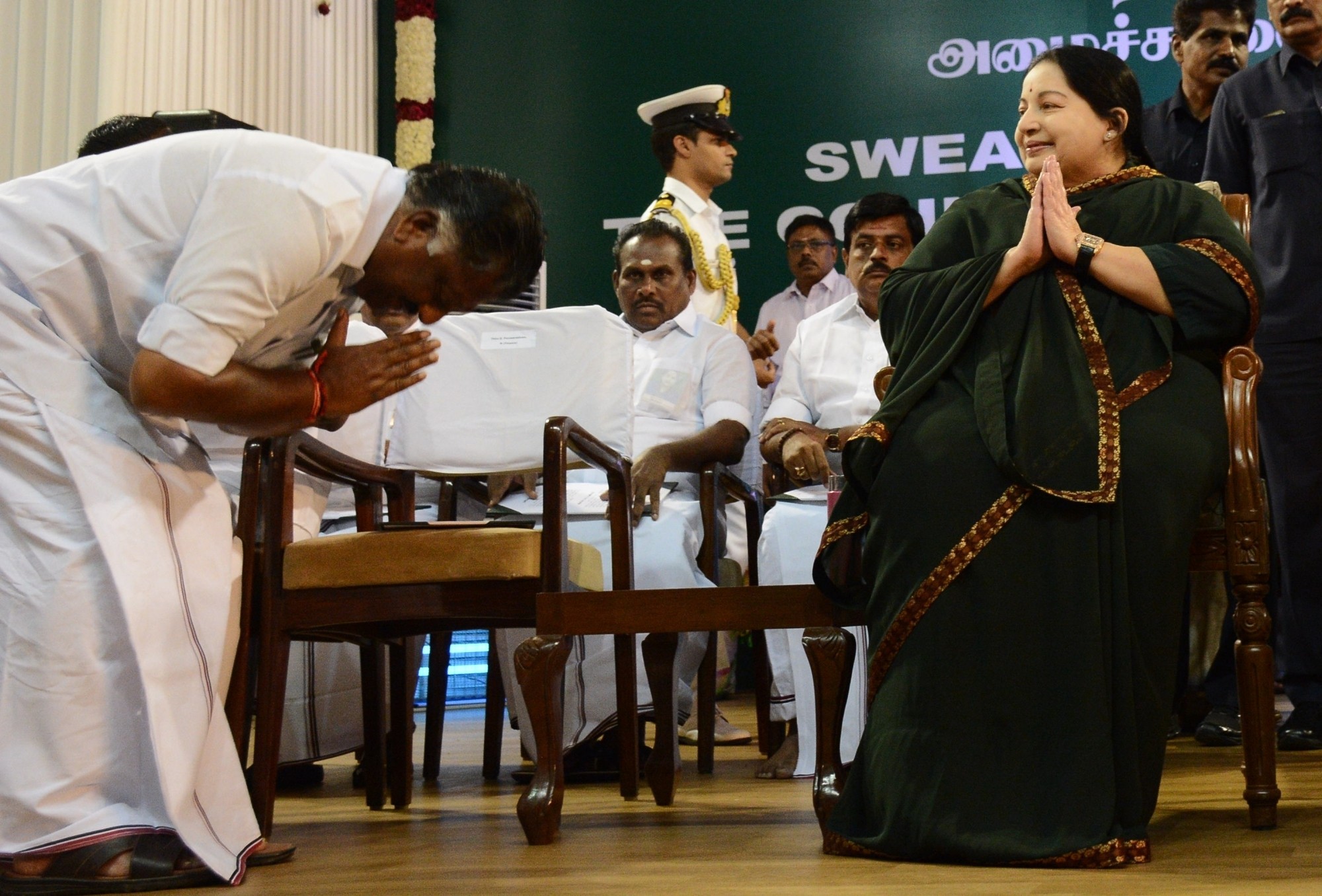 AIADMK leader O Panneerselvam bows to Jayalalithaa. Photo: IANS AIADMK leader O Panneerselvam bows to Jayalalithaa. Photo: IANS