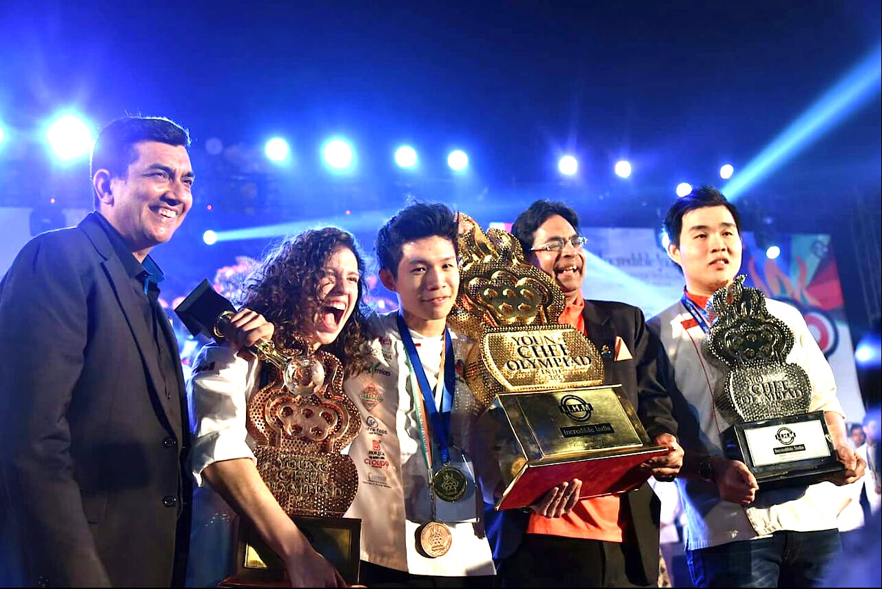 Tham Jiajun Mathew of Singapore along with Andrew Ou Kai Peng of Malaysia and Selah Joy Schmoll of Canada. Tham Jiajun Mathew of Singapore along with Andrew Ou Kai Peng of Malaysia and Selah Joy Schmoll of Canada.