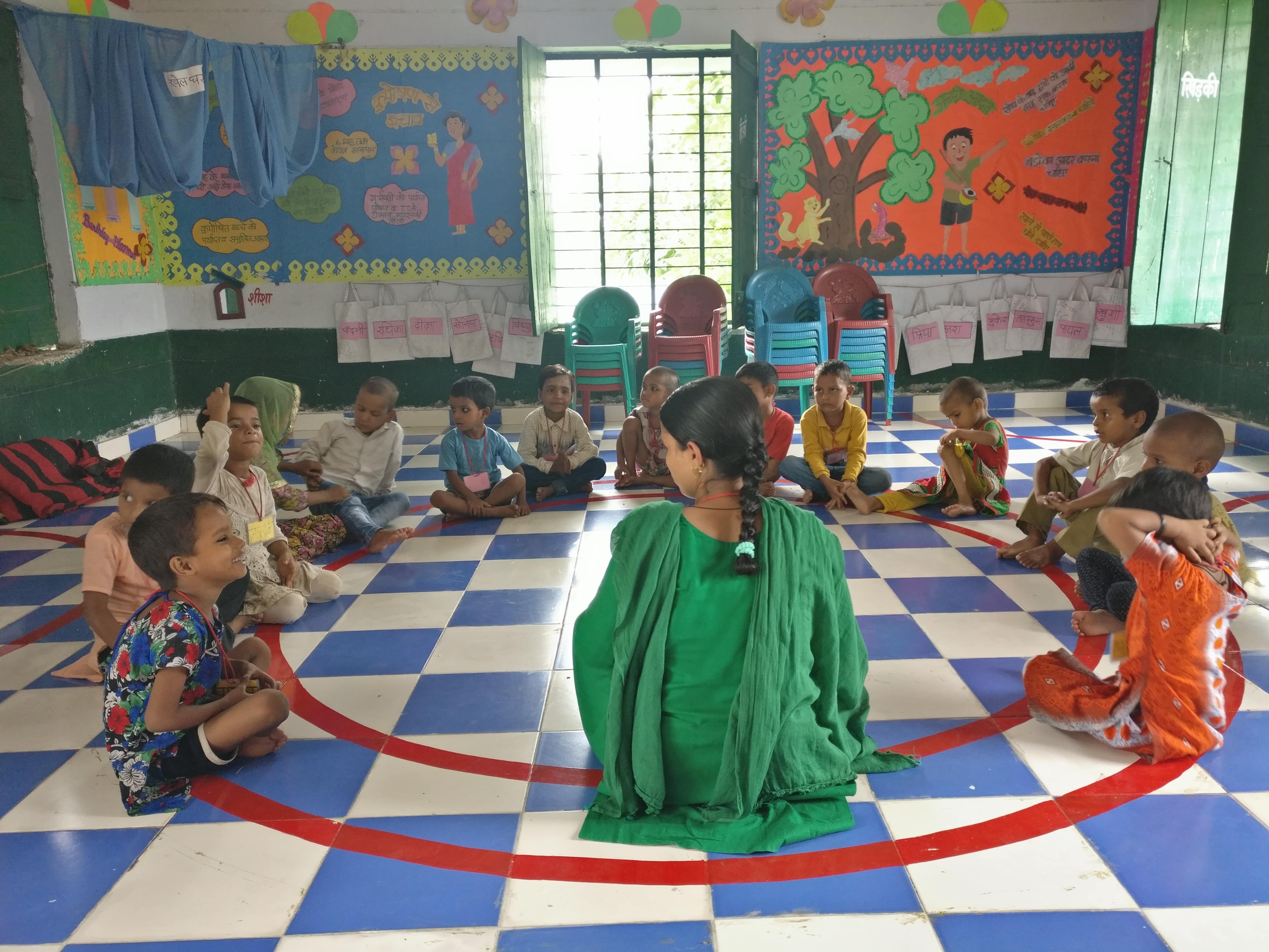 Children sit in a circle to improve their engagement skills. Photo credit: Shreya Roy Chowdhury Children sit in a circle to improve their engagement skills. Photo credit: Shreya Roy Chowdhury