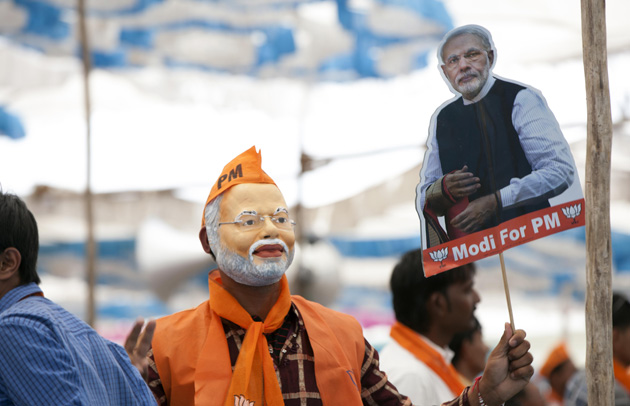 A man wearing a Modi mask. Credit: Wikimedia Commons A man wearing a Modi mask. Credit: Wikimedia Commons