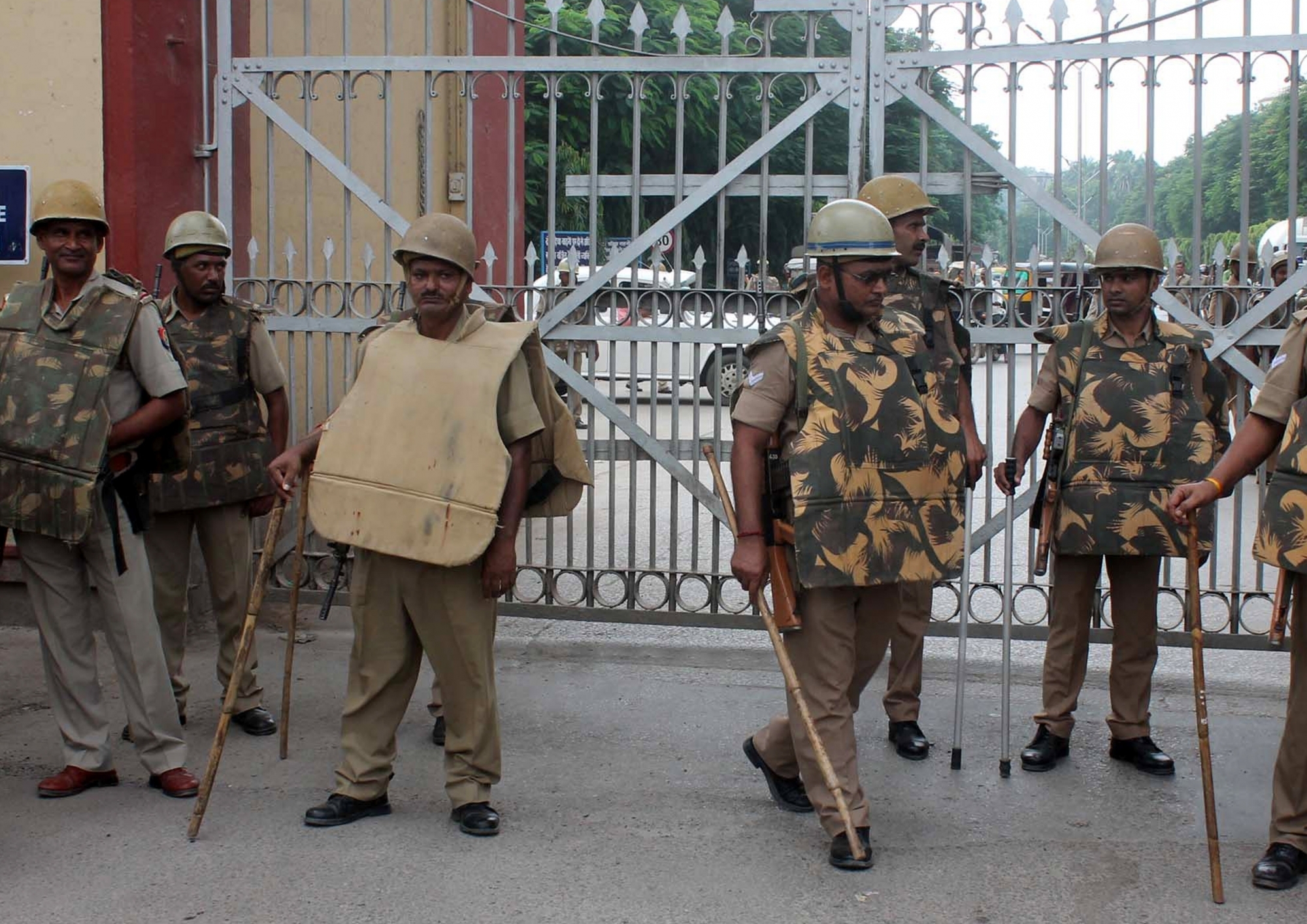 Security beefed up outside the Banaras Hindu University after police lathicharged the students while they were agitating against the molestation of a student inside the campus. Photo credit: IANS. Security beefed up outside the Banaras Hindu University after police lathicharged the students while they were agitating against the molestation of a student inside the campus. Photo credit: IANS.