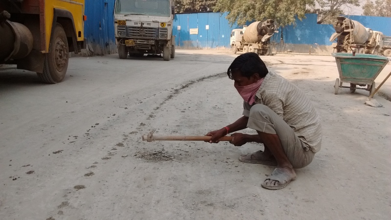 Worker at a construction site in New Delhi. Photo credit: Anumeha Yadav Worker at a construction site in New Delhi. Photo credit: Anumeha Yadav