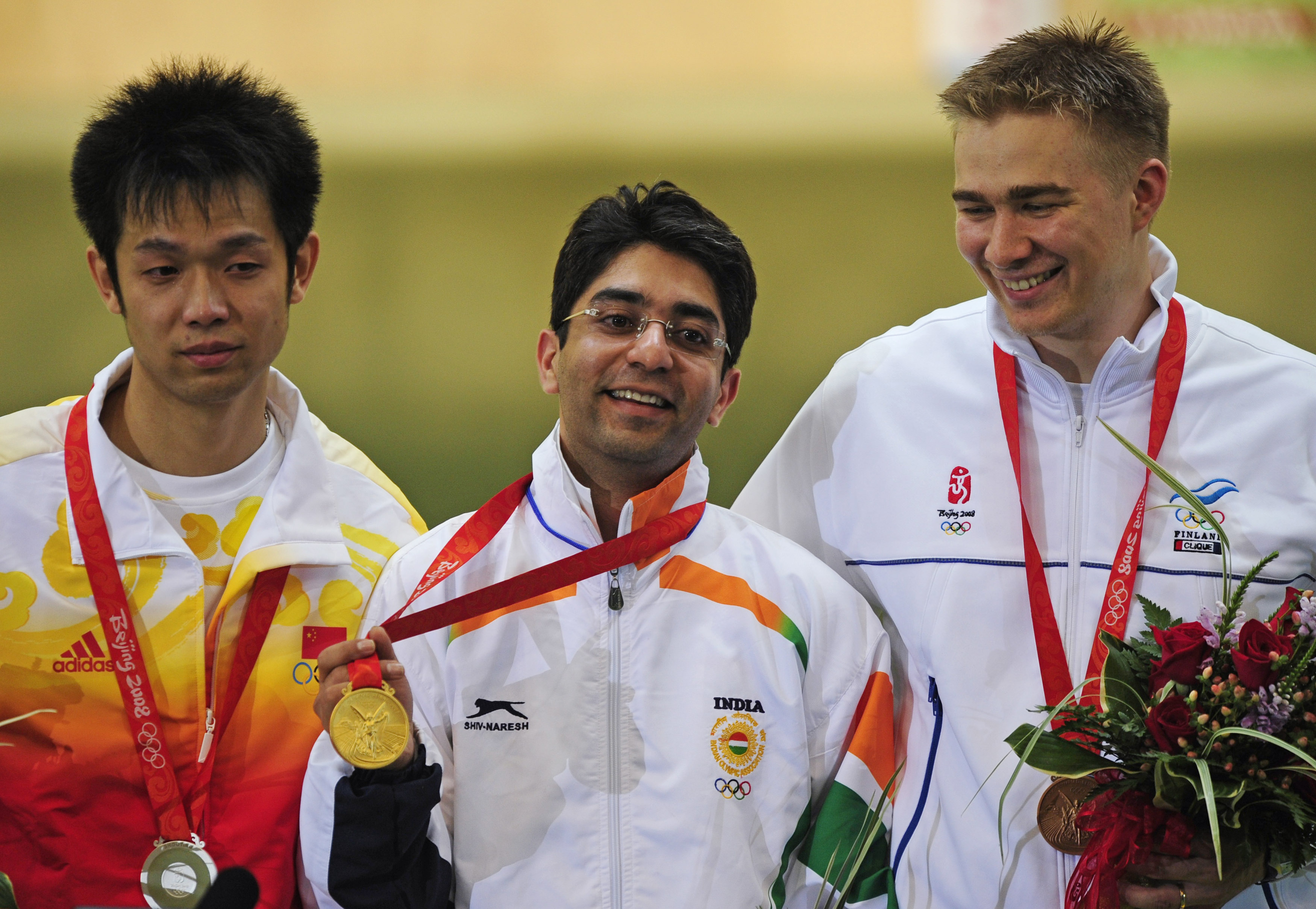 Abhinav Bindra with his Olympic gold medal. Image Credit: Desmond Boylan / Reuters Abhinav Bindra with his Olympic gold medal. Image Credit: Desmond Boylan / Reuters