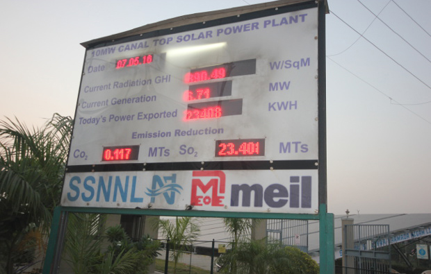 A board outside the 10 MW canal-top solar plant in Vadodara shows the daily export of power from the plant as well reduction in emissions. Image Credit: Mukta Patil / IndiaSpend A board outside the 10 MW canal-top solar plant in Vadodara shows the daily export of power from the plant as well reduction in emissions. Image Credit: Mukta Patil / IndiaSpend